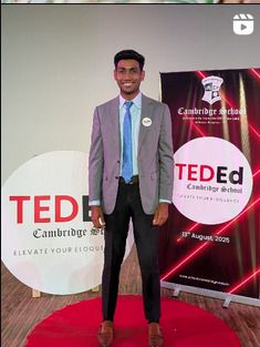 Manoj on stage at a TEDEd event at Cambridge School